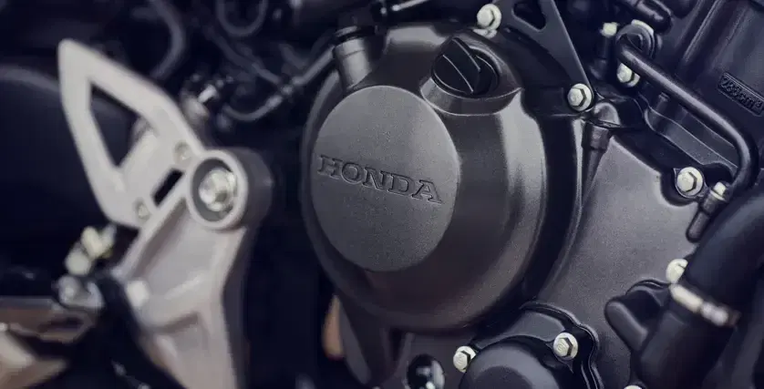 A single-cylinder DOHC four-valve Engine